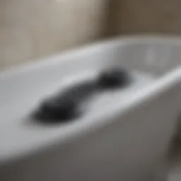 Clogged bathtub drain with visible hair blockage