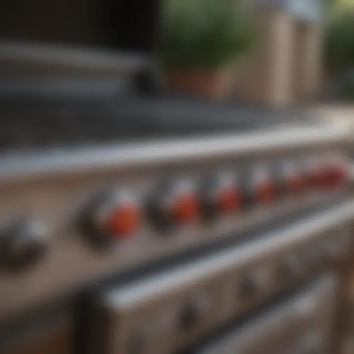 Detailed view of a propane grill's control knobs