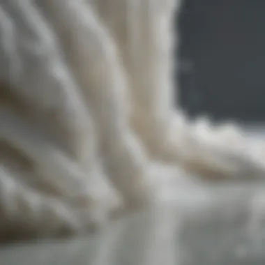 Impact of Water Type on Fabric Whiteness A split image showing pristine white clothes washed in soft water versus discolored clothes from hard water.