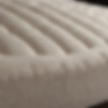 The Distinct Material of a Tempurpedic Mattress Close-up view of a Tempurpedic mattress showcasing its unique material