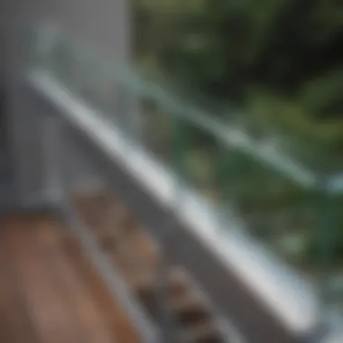 Close-up of glass railing installation showcasing hardware