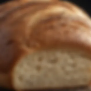 Close-up of freshly baked bread with a crispy crust and soft interior.