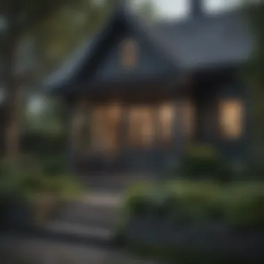 A cozy cottage with dark grey exterior paint, surrounded by lush greenery, illustrating a classic architectural style.