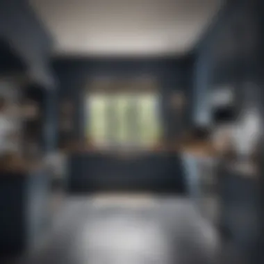 An elegant kitchen showcasing gray cabinets paired with a deep navy blue wall