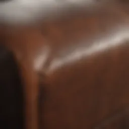 Close-up of a leather couch showing early signs of peeling