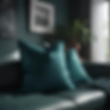 Stylish dark teal throw pillows on a modern sofa