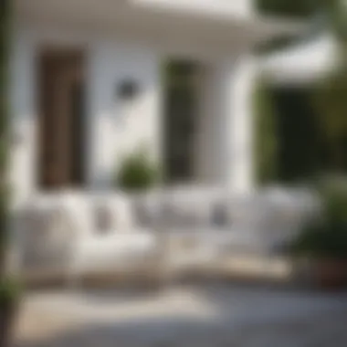 Stylish small white patio set with decorative cushions