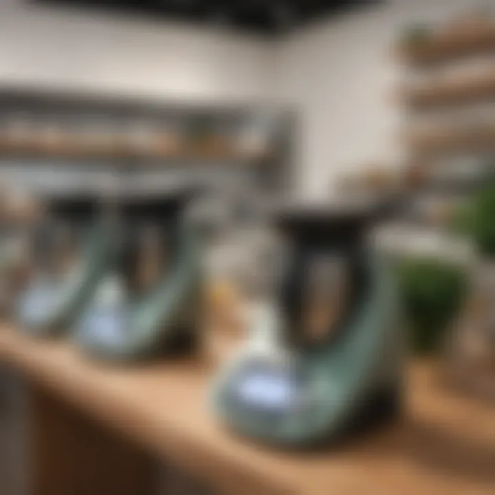 A showcase of Thermomix models in a retail store